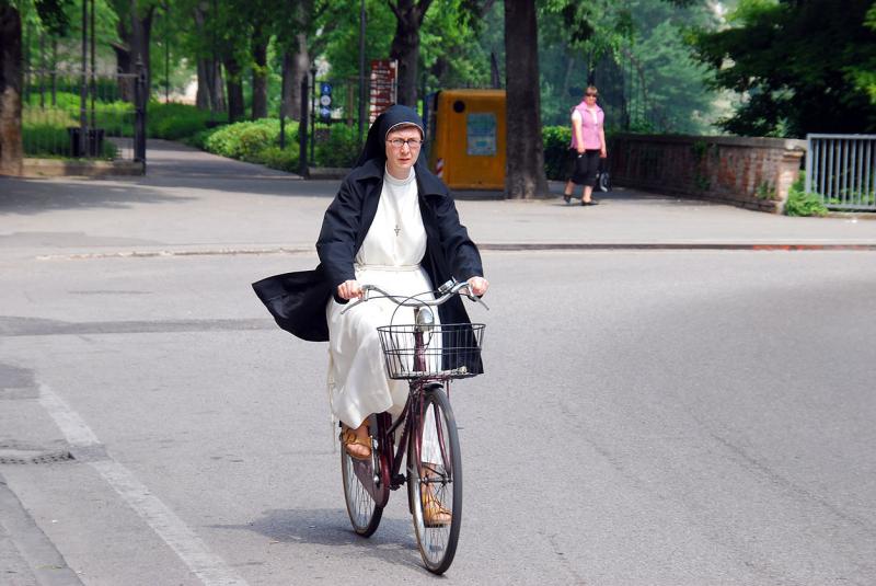 Nun on a bike